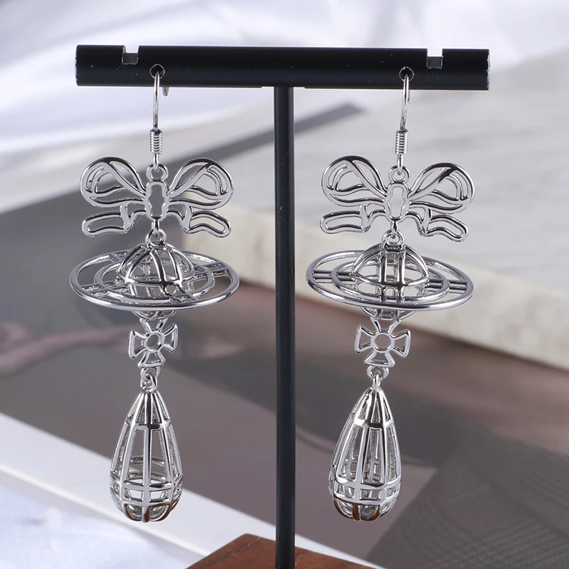 أقراط على شكل فيونكة مجوفة من HQ للسيدات من النحاس المطلي بالذهب بتصميم قطرات الماء أقراط عصرية مخصصة إكسسوارات فاخرة هدايا