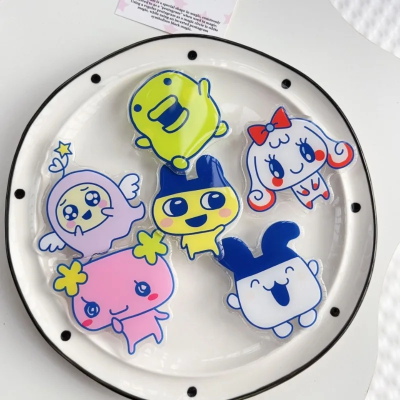 

Tamagotchi The Phone Holder with Airbag Stand Is Suitable for All Phones Cartoon and Anime Derivative Merchandise Holders Gifts