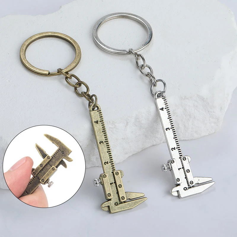 

1/2PCS Portable Mini Vernier Caliper Keychain Metal Ruler Keychain Movable Vernier Caliper Ruler Model Hanging Decoration Crafts