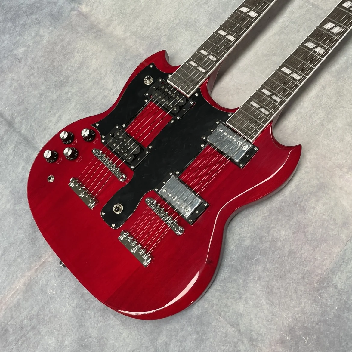 

Left-handed double-headed 6-12-string red electric guitar, rosewood fingerboard, mahogany, white hardware electric guitarrs guit