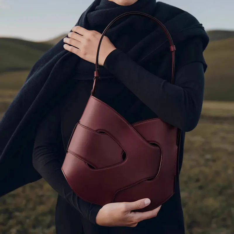 

French niche new woven bag Nodde Hobo smooth cowhide twisted bag handbag crossbody bag