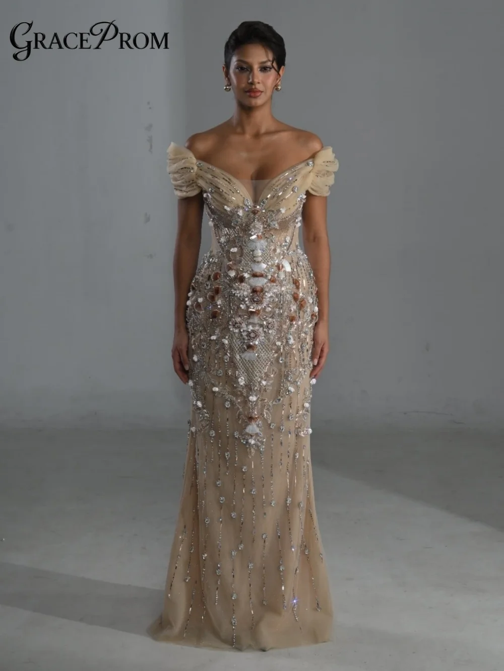 

Luxurious Nude Tulle Mermaid Party Dress Exquisite Crystal 3D Flower Off Shoulder Evening Gown for Wedding Guests فساتين سهرة