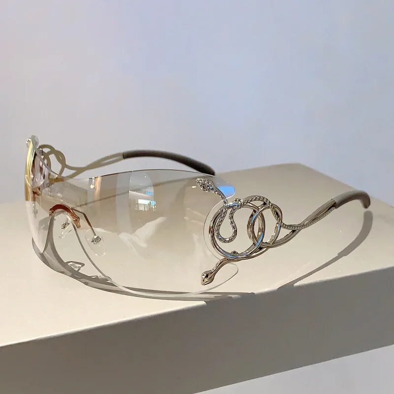 

Y2K Rimless Luxury Brand Designer Sunglasses Women For Men One Piece Trendy Oversized Sun Glasses Metal Snake Pink Punk Shades