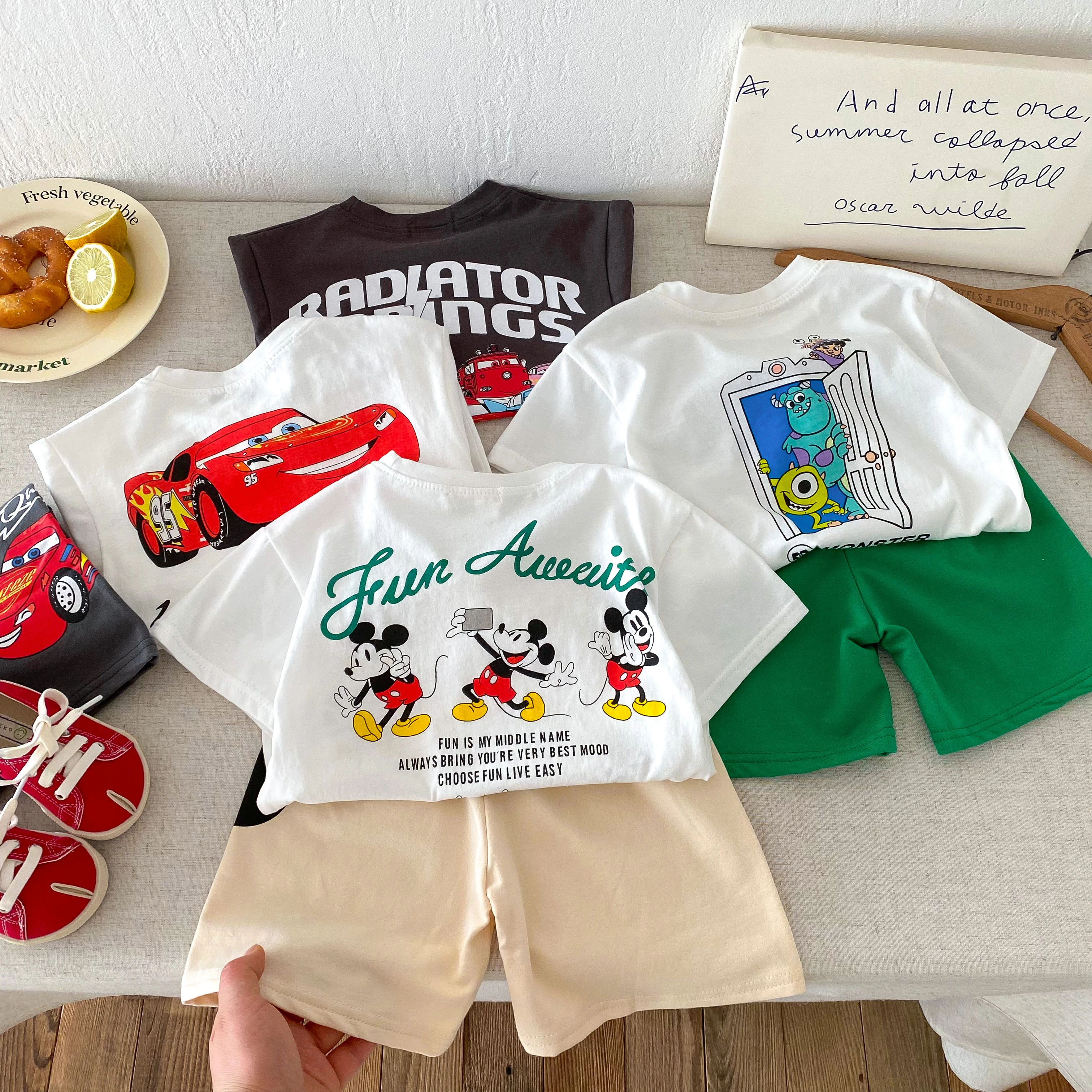 NOVEDAD DE VERANO 20225, conjunto de camiseta y pantalones cortos estampados a la moda para niños, ropa holgada para niños, nueva ropa informal de verano