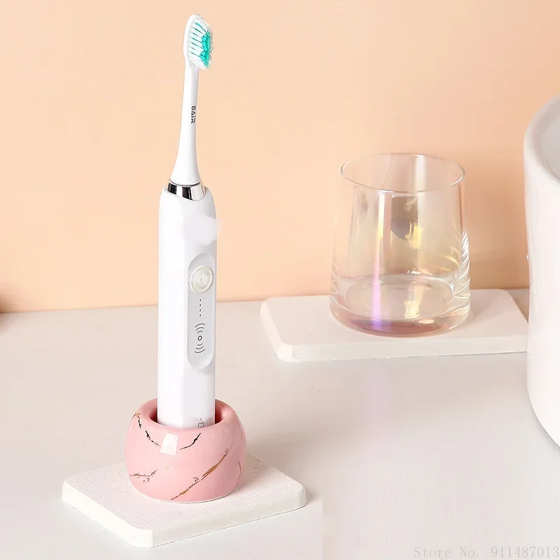Electric toothbrush holder rack free punch swing table diatom mud toothbrush holder home bathroom countertop storage wash cup