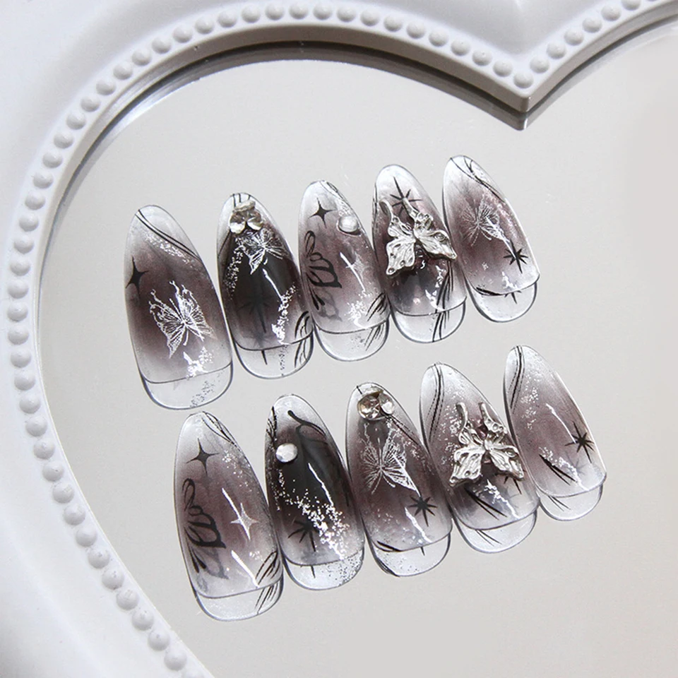 24 piezas uñas postizas largas stiletto negras con moño plateado asimétrico, set de uñas con polvo 2