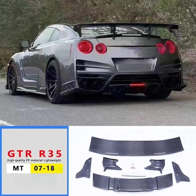 

Комплект обвеса из полукарбона: передний и задний бамперы, боковые пороги, накладки на фары, спойлер капота для GTR R35, детали для внешнего тюнинга