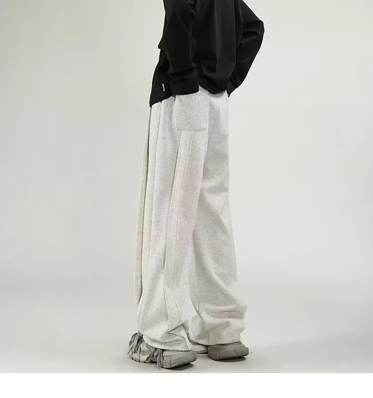 Pantaloni della tuta a gamba larga coreani uomo pantaloni larghi Casual tinta unita maschili Streetwear vestiti 2024 primavera autunno moda pantaloni della tuta da uomo