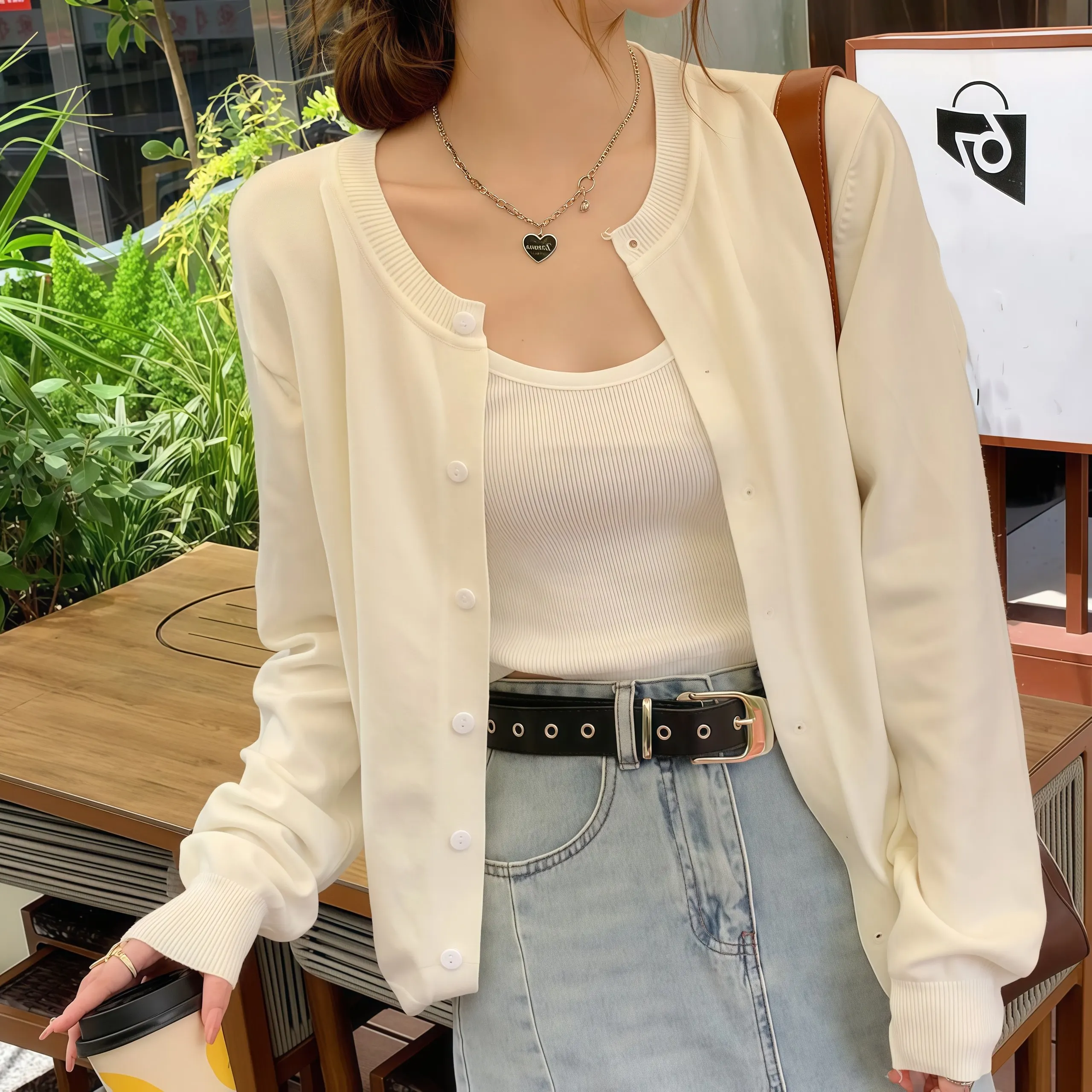 

2025 Hot Lady Solid Color Fashionable Casual Button Loose Long Sleeved Knitted Cardigan