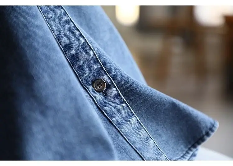 سترة نسائية بنمط جديد مع جيوب بأزرار وطية صدر السترة عصرية بلون سادة وفضفاضة ومتعددة الاستخدامات من قماش الدنيم