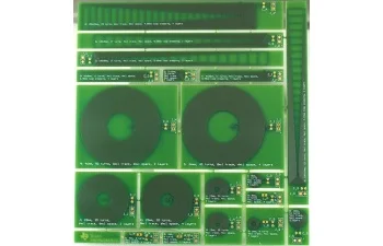 LDCCOILEVM evaluation module paired with 19 PCB coils for inductance digital converter