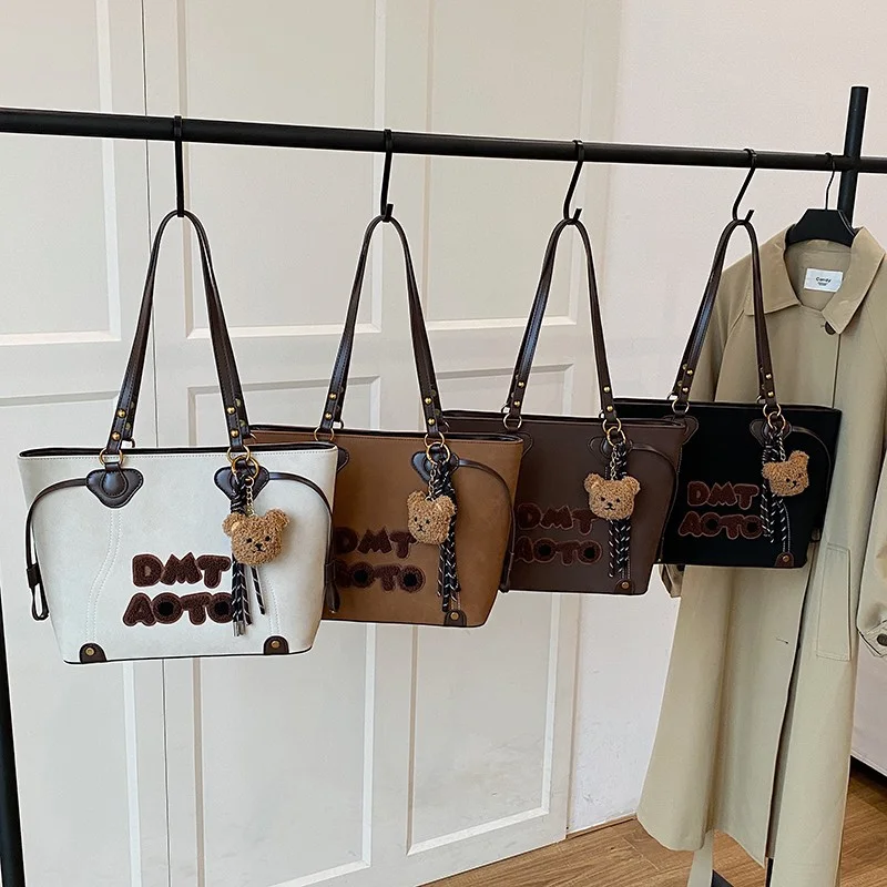 

Новая высококачественная женская сумка, модная нишевая сумка через плечо для повседневного использования.