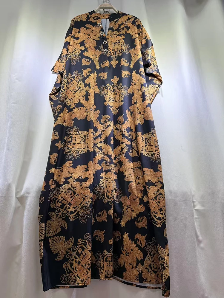 レトロな幾何学模様のプリント、ドアチューブ型の半開襟プルオーバードレス、2025年秋のレディースファッション、ゆったりとしたオーバーサイズのふわふわスカート