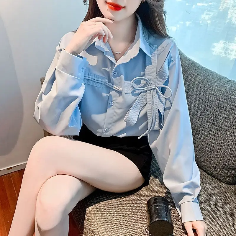 Fashion Solid Color Spliced Button Lace Up Bow Shirts Female Clothing 2023 Autumn Winter New Loose Korean Tops All-match Blouses