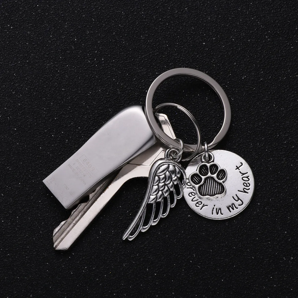 Creative Pet Footprint Keychain with Angel Wing Charm Memorial Souvenir for Passed Pets Exquisite Detail Metal Key Ring Ornament