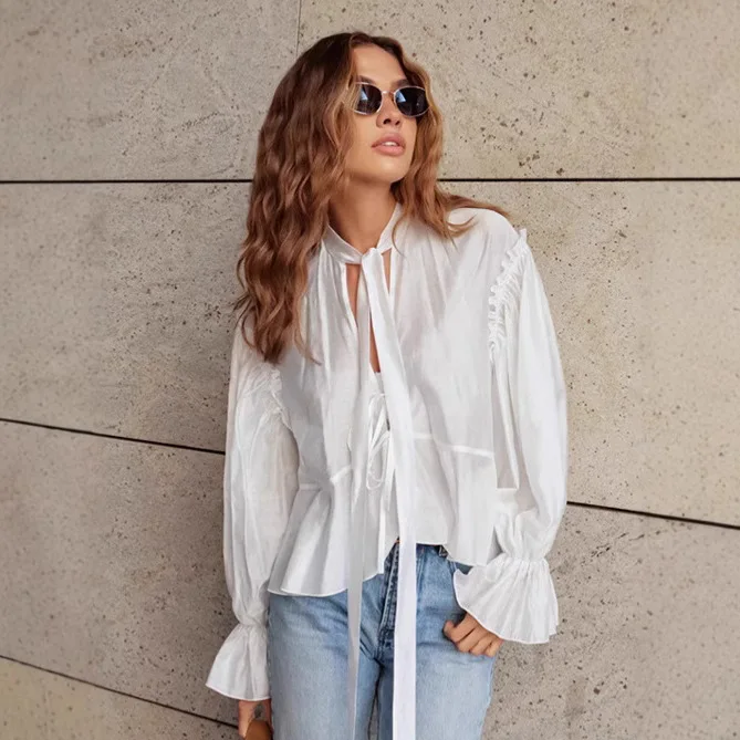 

Элегантная осенняя женская блузка на шнуровке, однотонный пуловер с расклешенными рукавами, рубашка для женщин, темпераментная женская блузка в стиле минимализма