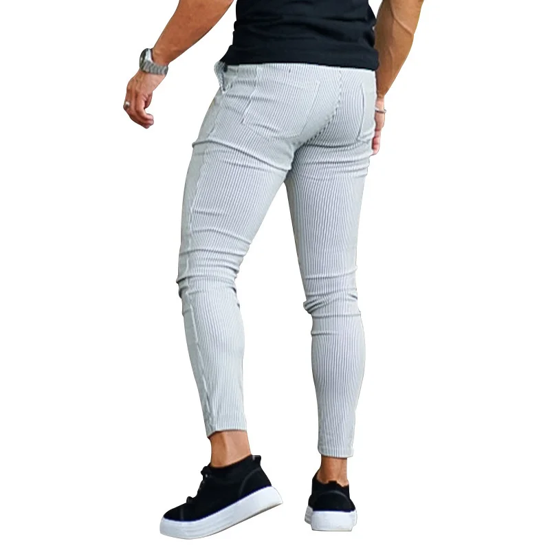 Pantalones pitillo ajustados de cintura alta para hombre, pantalones a rayas informales, ropa de calle de moda, nueva tendencia, cuatro estaciones