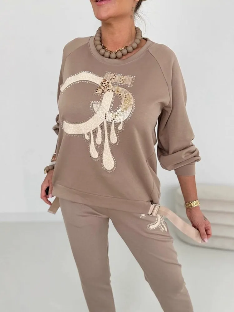 Set da donna da 2 pezzi 2025 Nuovo arrivo Autunno Inverno Set coordinati Set da due pezzi Top a maniche lunghe e pantaloni Abiti Abiti Abbigliamento