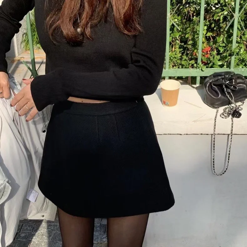 تنورة قصيرة بخصر مرتفع على شكل حرف A بلون واحد متعددة الاستخدامات من الصوف التانات تنورة قصيرة على الطراز الكوري مطرزة للسيدا... #4