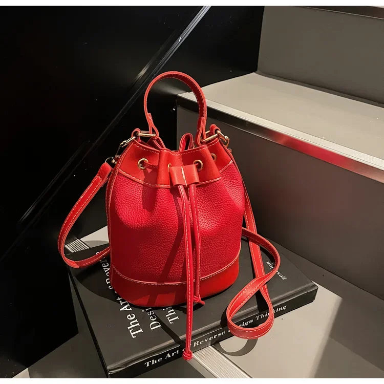 

Retro Luxury Personality Simple Handbag Fashion Advanced Drawstring Bucket Bag Commuting Color Matching Crossbody Bag