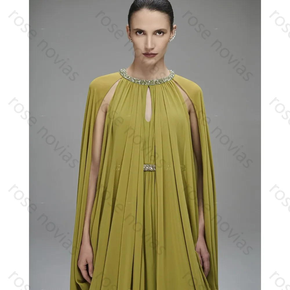 Customized Green Formal Evening Gown with Cape Sleeves Crystal-Embellished Neckline and Keyhole Detail for Gala