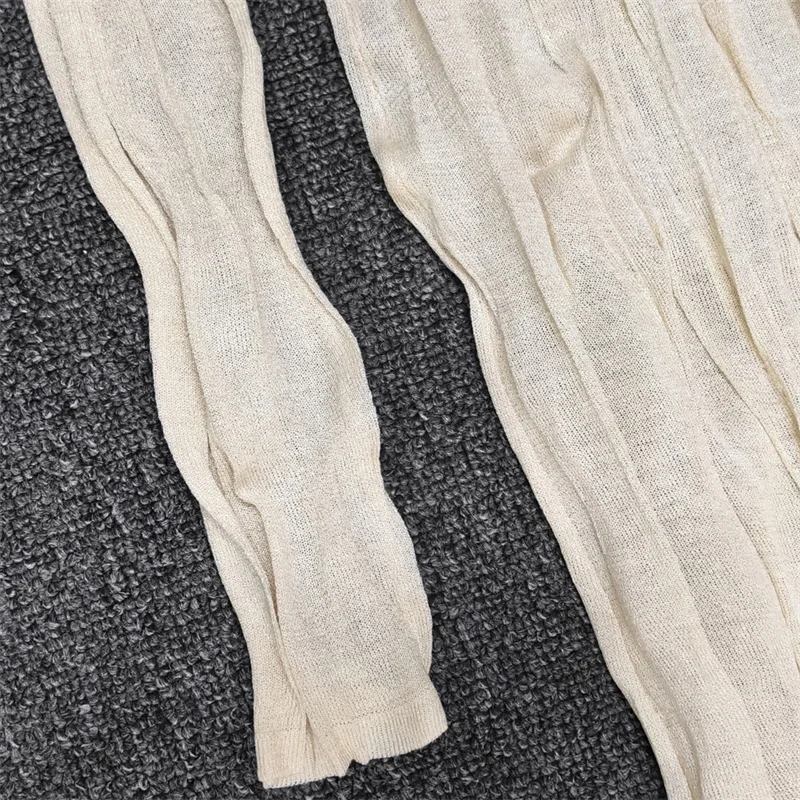 Immagine 6: Abiti casual da donna: Nuovo vestito lungo slim fit girocollo per l'estate 2026, in maglia elasticizzata che avvolge i fianchi, perfetto per le vacanze.