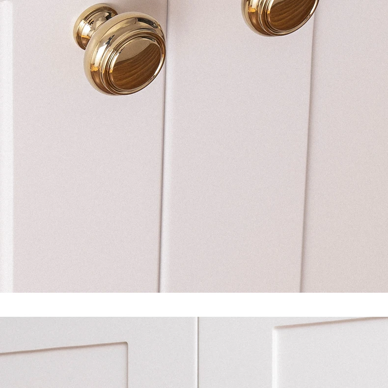 Gold furniture pulls and round knobs installed together
