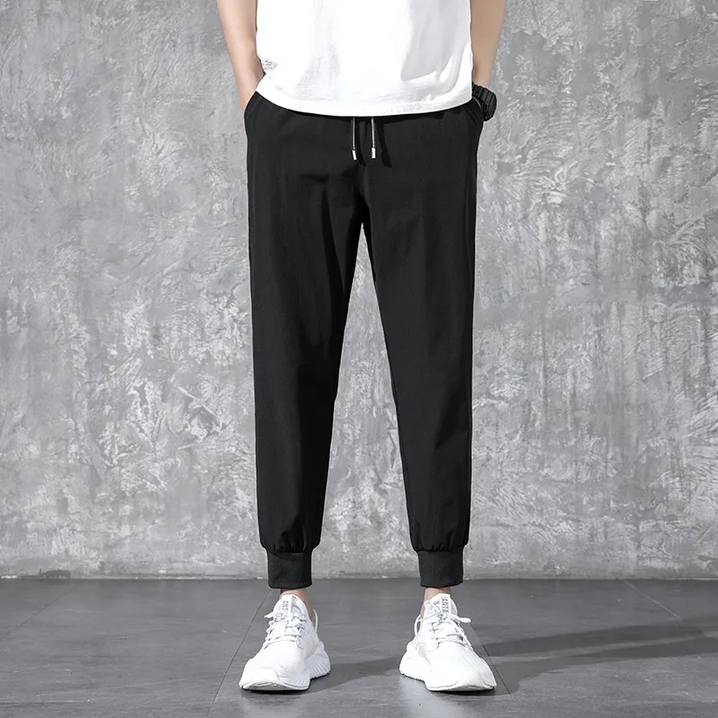 Men Casual Pants Fitness Sportswear Tracksuit Bottoms Skinny Sweatpants Cotton Trousers Gyms Jogger Track Pants Mens Joggers