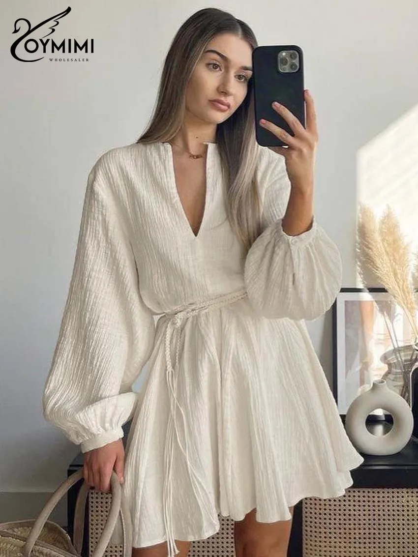 Oymimi eleganckie beżowe bawełniane sukienki damskie moda dekolt w serek z długim rękawem sznurowane sukienki na co dzień luźna plisowana Mini sukienka Streetwear