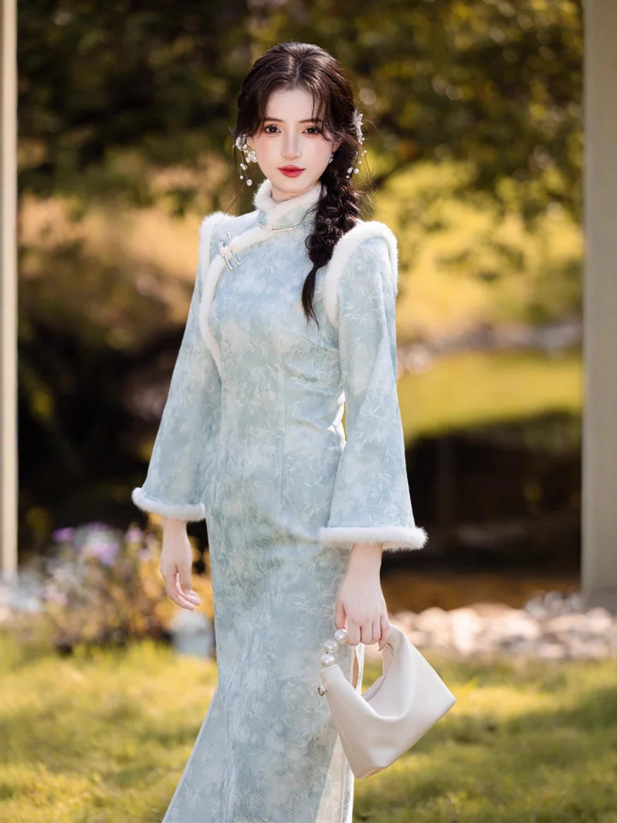 شيونغسام طويل سميك جديد لشتاء 2025 بأكمام كبيرة مقلوبة وياقة واقفة بقصة ضيقة من تشيباو