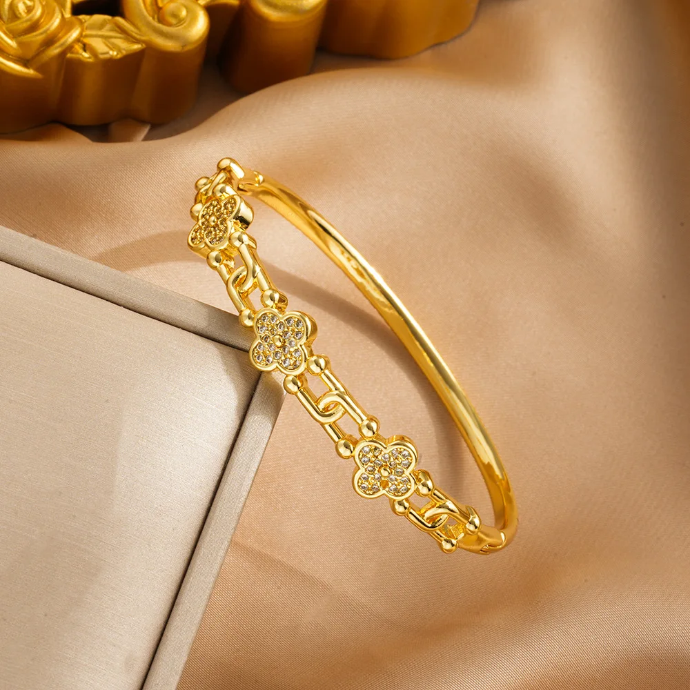 

Модный и индивидуальный металлический браслет с цветочным узором в форме подковы, выделяет ощущение высококачественного и модного очарования.