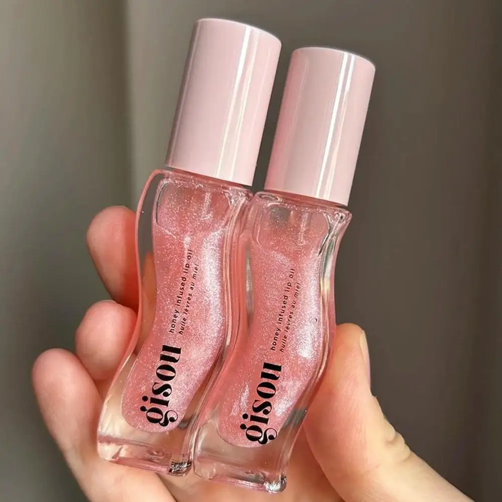 الفاكهة العسل جوهر زيت الشفاه مثير طبطب الشفاه هلام الفراولة ملون الشفاه السائل مقاوم للماء ترطيب النفط ملمع الشفاه ماكياج ماكياج ﻿