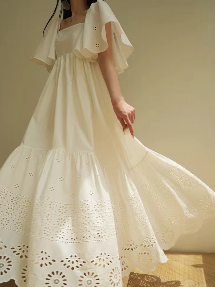 Vestido de cintura alta con cuello cuadrado bordado y ahuecado, falda abullonada plisada holgada a la moda de verano 2025 para mujer