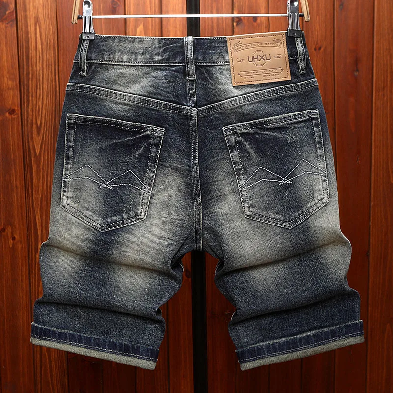 High end ripped patch denim shorts for men in the summer of 2025, scraped and fashionable trend, classic retro pants