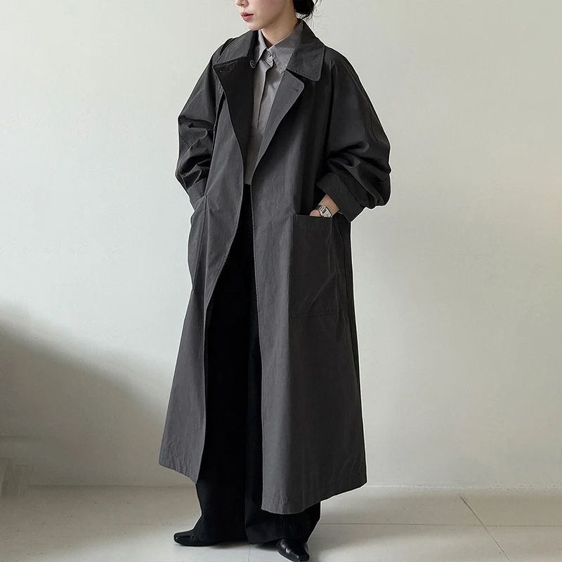 

FANAN Elegant Belt Gathered Waist Trench For Women Lapel Irregular Button Office Lady Long Windbreaker Fashion 2025 Autumn New