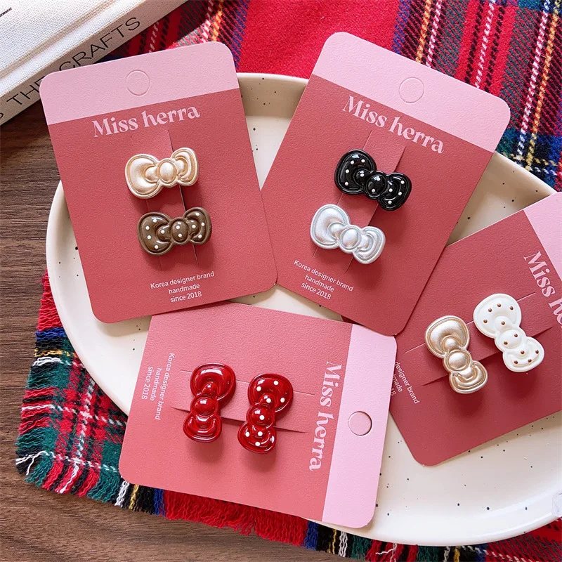 

Korean Glossy Polka Dot Bow Hair Clips 2-Pack Mini Size for Little Girls Resin Coating Side Barrettes Non Slip Daily Essentials