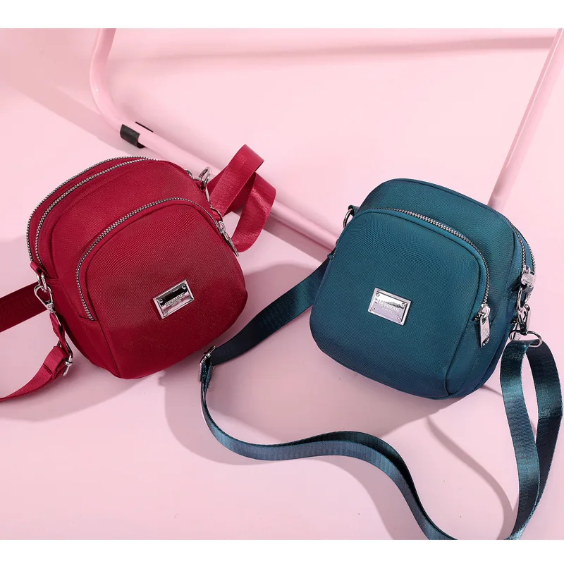 Mini bolsa feminina concha, tecido de nylon, um ombro, bolsa tiracolo para celular casual e simples, nova tendência, outono e inverno, 2023