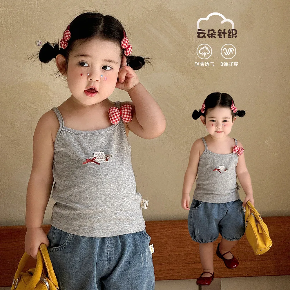 

2026 New Baby Girls Summer Cute Bow Doll Decor Tank Tops Fashion Sleeveless Camisole Vest Soft Casual Toddler Kids Sweet Wear