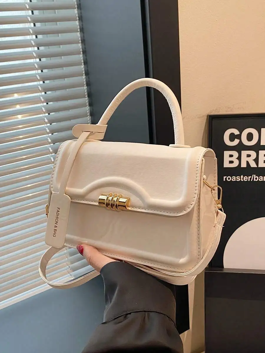 

Cream Structured Crossbody Bag with Gold Clasp and Detachable Strap