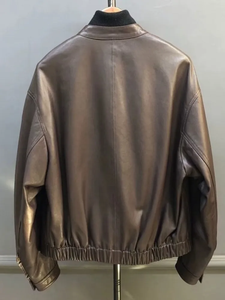 سترة منفوخة بلون سادة من الجلد الطبيعي على الطراز الكوري فضفاضة وجيب واحد الصدر وأكمام طويلة من جلد الغنم ملابس خارجية للسيدات