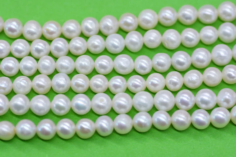 

6-7MM AAA+AA 5PCS full strand. Natural bright white freshwater pearl loose beads. Near round pearl 15"