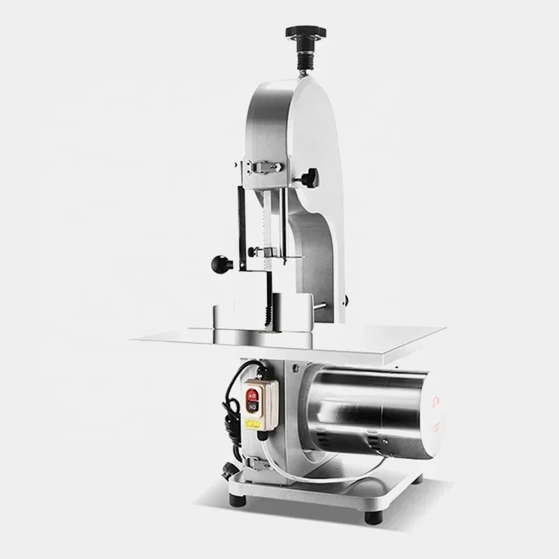 

Commercial desktop bone cutter Automatic electric small bone cutter based on frozen pork trotters. Hot sales
