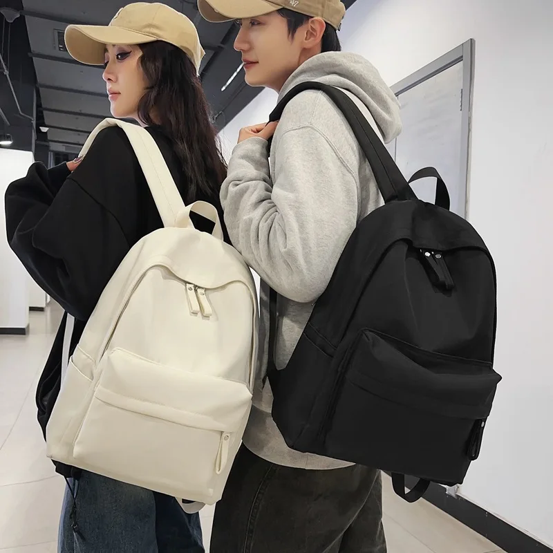 حقيبة ظهر للطلاب بلون سادة 2026 حقيبة ظهر ذات سعة كبيرة على طراز الكلية حقيبة سفر حقيبة ظهر ترفيهية #1