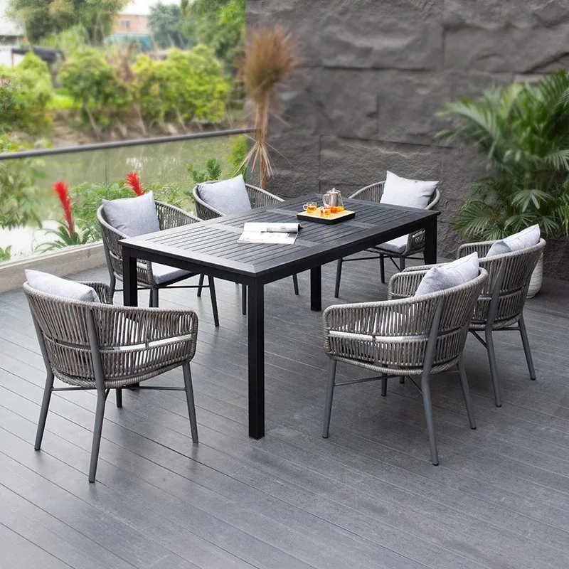

Modern Outdoor Black Wood Plastic Table PE Rattan Foldable Chair Waterproof Furniture For Hotel Courtyards Villa Dining Sets