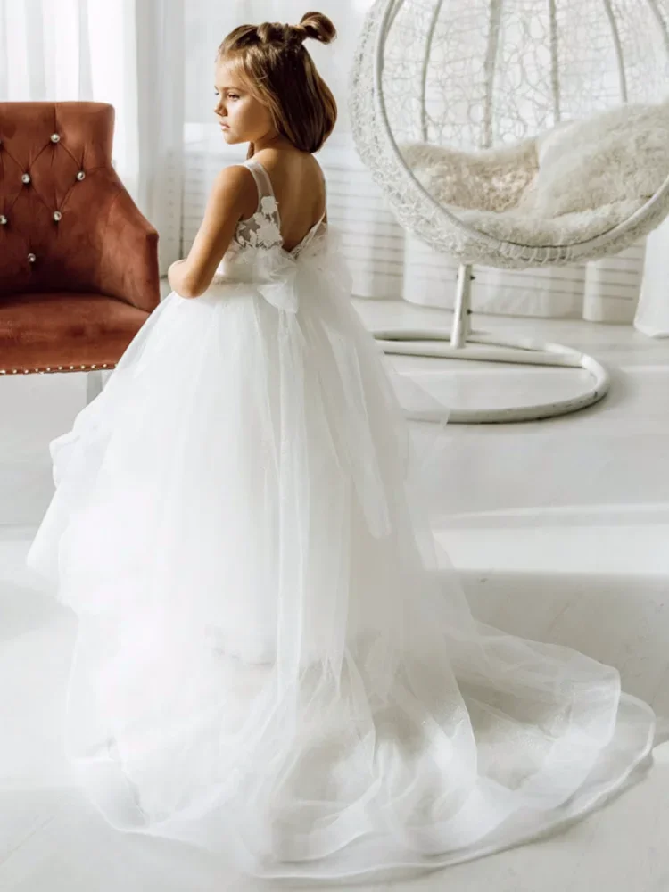 Con coda e spalla con fiocco senza maniche per matrimonio, compleanno, abiti da prima comunione, abiti da ragazza di fiori, applicazioni in tulle bianco