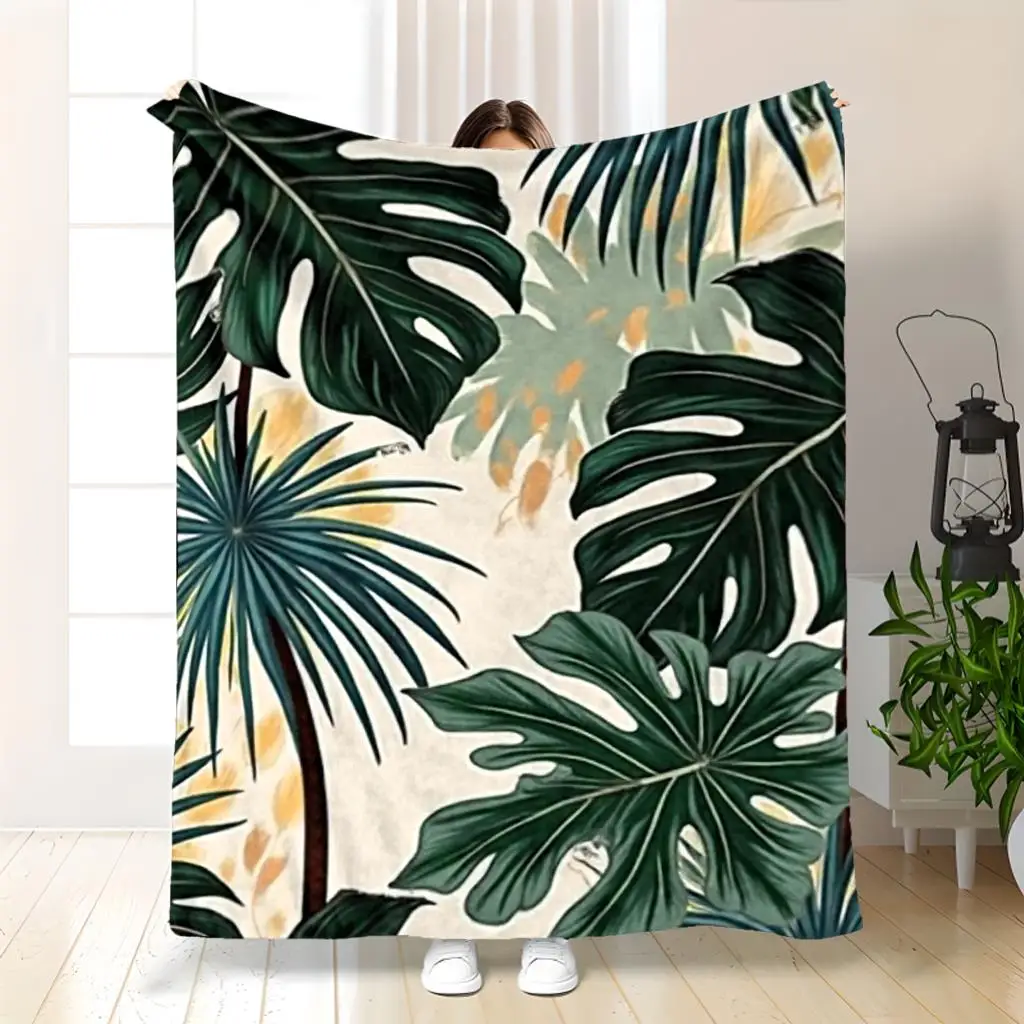 Tropical palm leaf and gold leaf patterned blanket, made of polyester, machine washable, suitable for bedrooms and living rooms