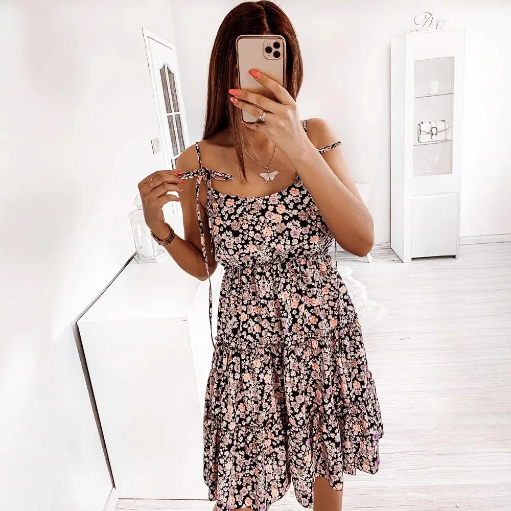 New European and American spring and summer express sales small floral temperament commuter shoulder strap sexy dress 8558