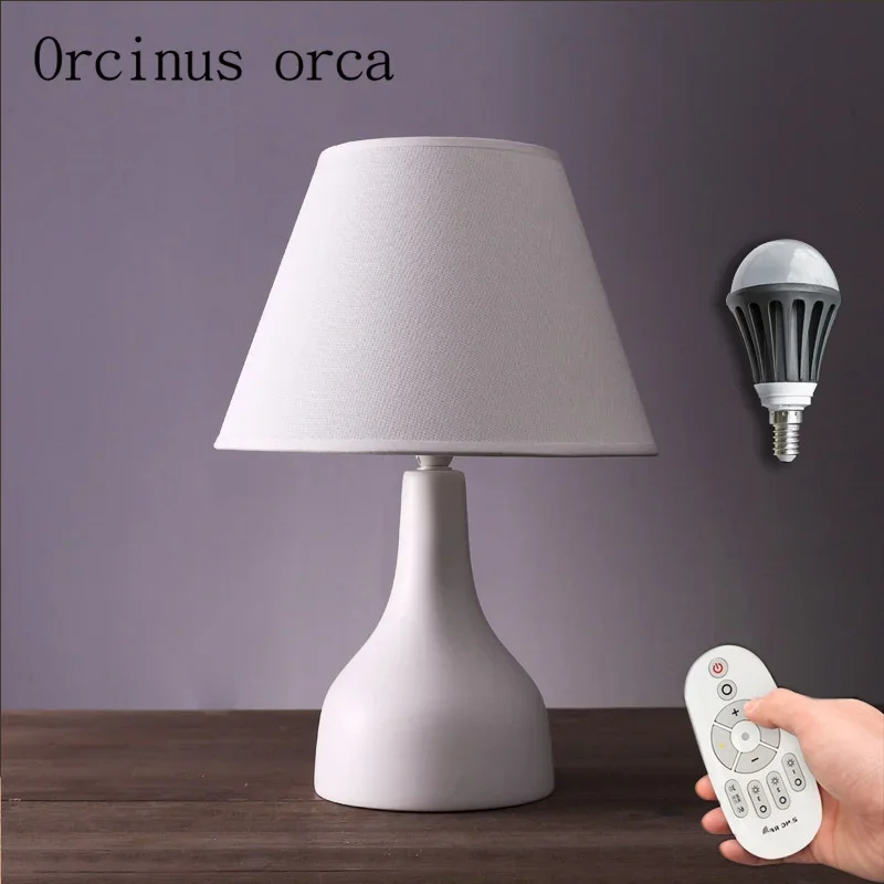 

Nordic simple modern table lamp living room bedroom bedside creative American lovely warm ceramic table lamp Postage free