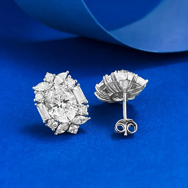 

NEW New Minimalist and Stylish 7 * 9mm Oval Pigeon Egg Simulation Diamond Four Claw Earrings