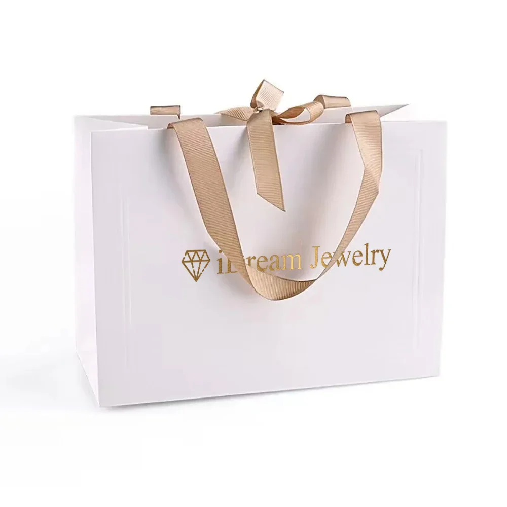 Bolsa de embalaje de joyería y cosméticos Premium con estampado de logotipo personalizado, bolsas de papel para compras de regalo Kraft de lujo con asas